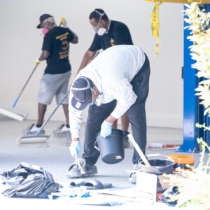 workers applying epoxy floor coatings